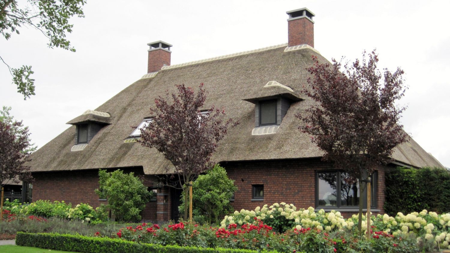 rietgedekte villa erp